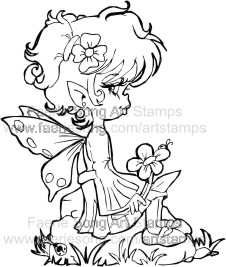 Sweet Pixie sitting on a rock holding a flower